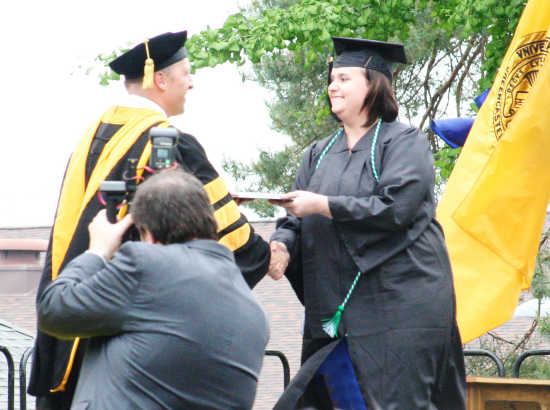 She Mahoney-Sutherland receiving her diploma